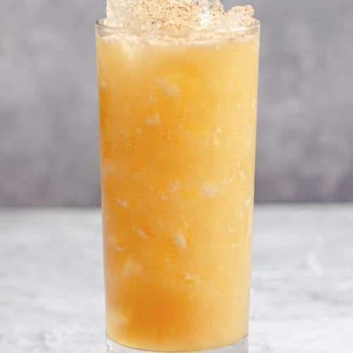 A fruity tropical rum cocktail in a tall glass.