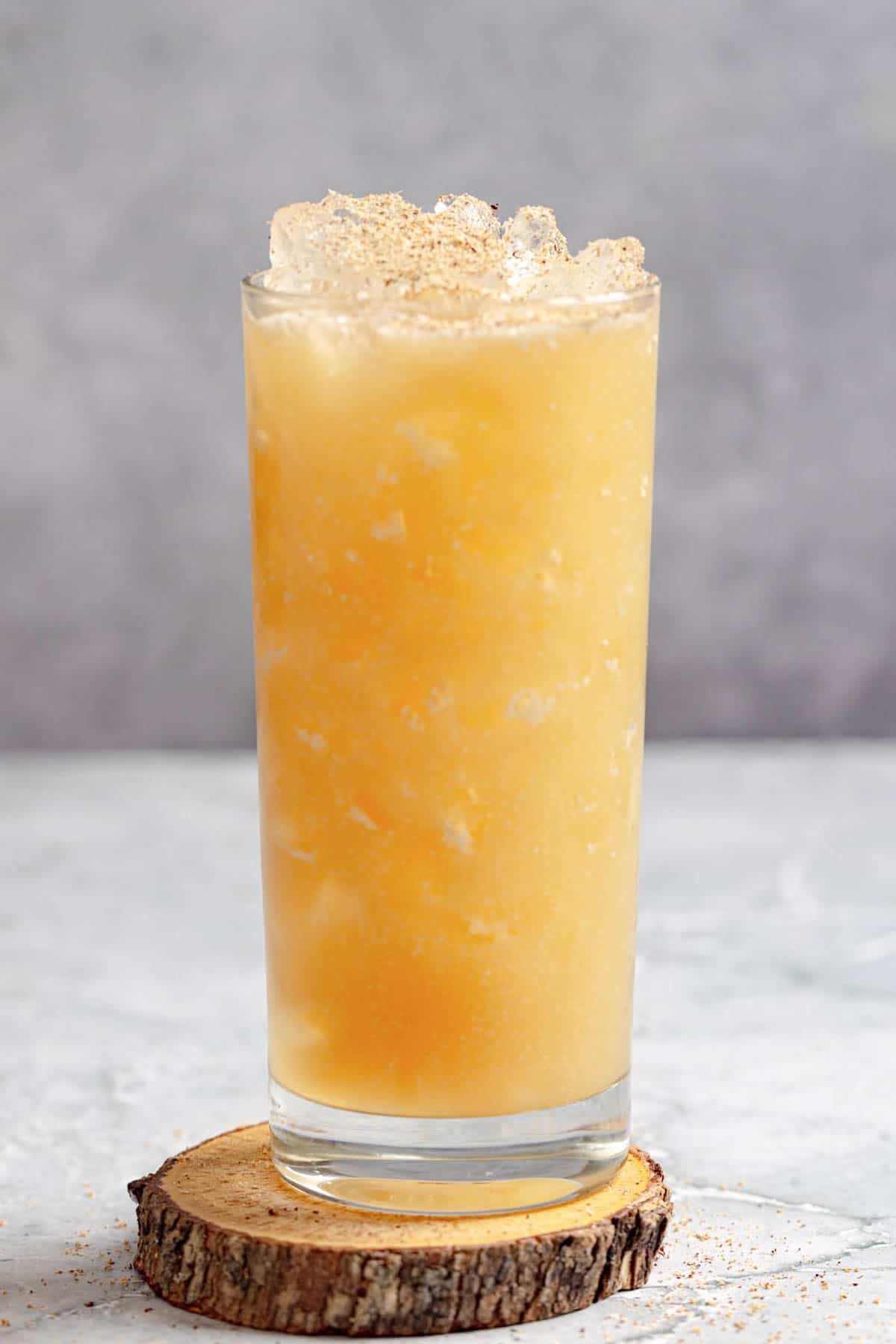A fruity tropical rum cocktail in a tall glass.