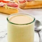 Spicy ranch dressing served with a sub sandwich.