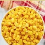 Buttered sweet corn kernels served in a small bowl.