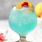 Copycat Texas Roadhouse Kenny's Cooler cocktail in a goblet glass.