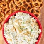Mini pretzels next to a bowl of million dollar dip.