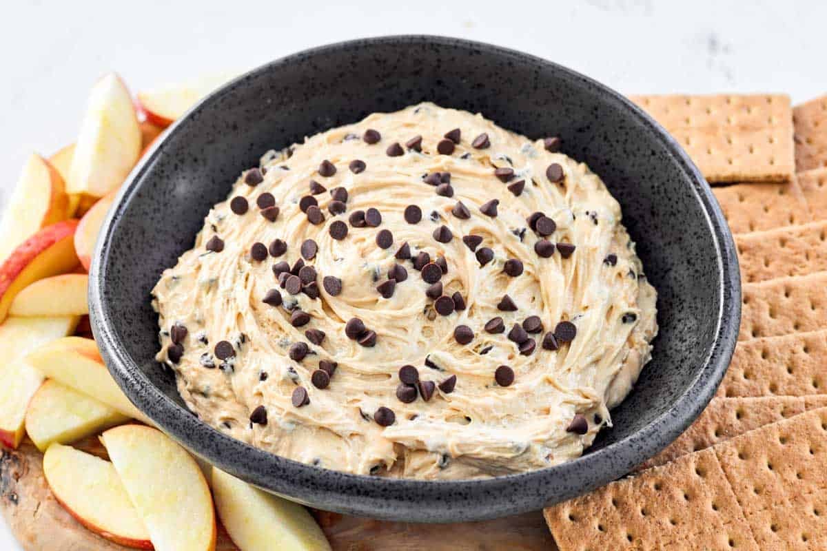 Creamy peanut butter chocolate chip dip served with apples and graham crackers.