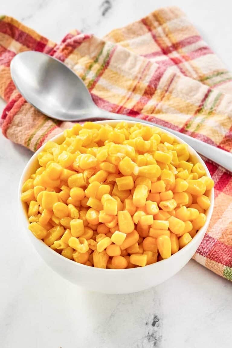 Buttery sweet corn kernels served in a small bowl.