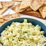 Copycat Cava spicy feta cheese dip served with pita bread triangles.