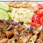 Cava harissa honey grilled chicken with rice, veggies, feta, and pita bread.