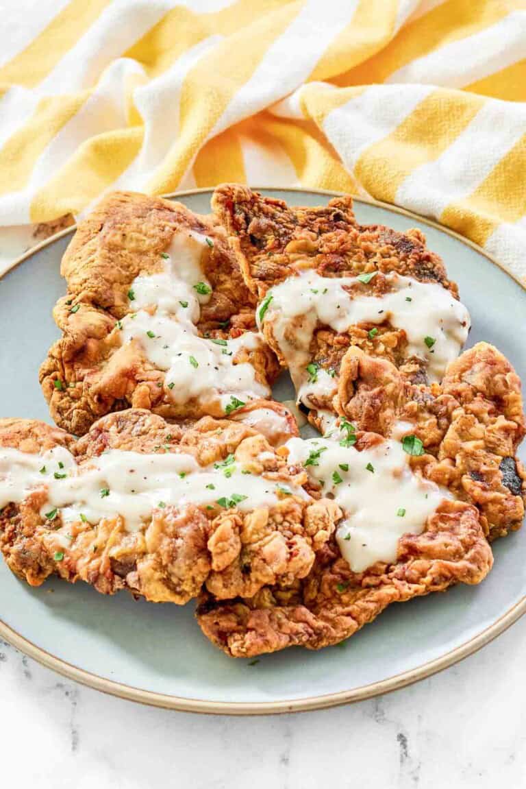 Crispy batter fried steaks topped with cream gravy.