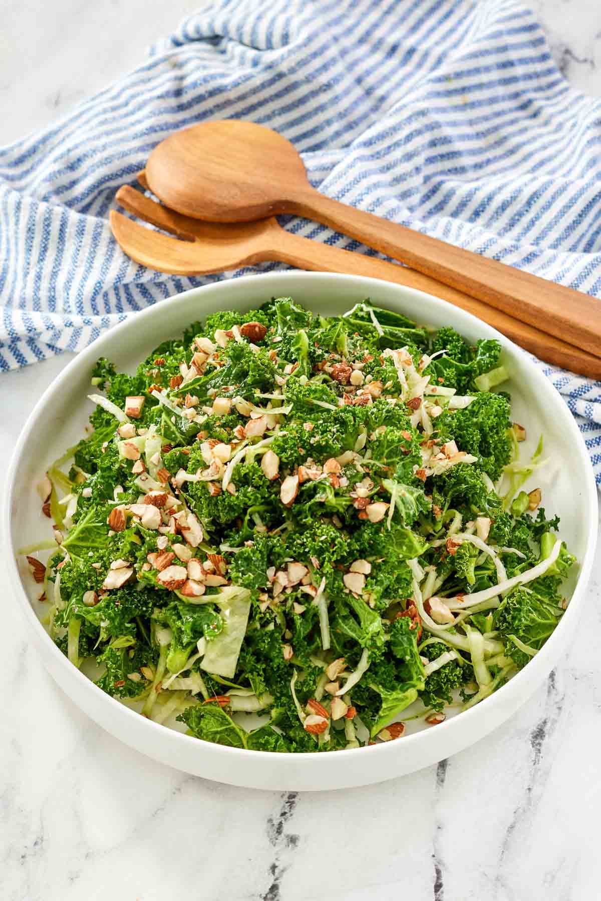 A crunchy salad with kale, cabbage, and almonds.