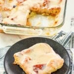 Copycat Duff's bread pudding in a baking dish and a serving on a plate.