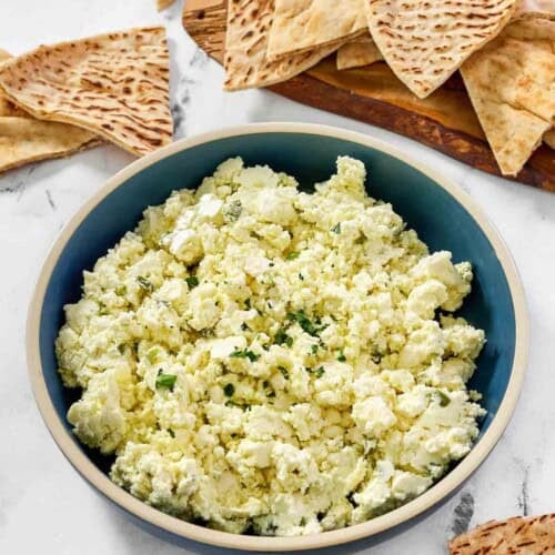 Feta cheese, onion, and jalapeno dip served with pita bread.