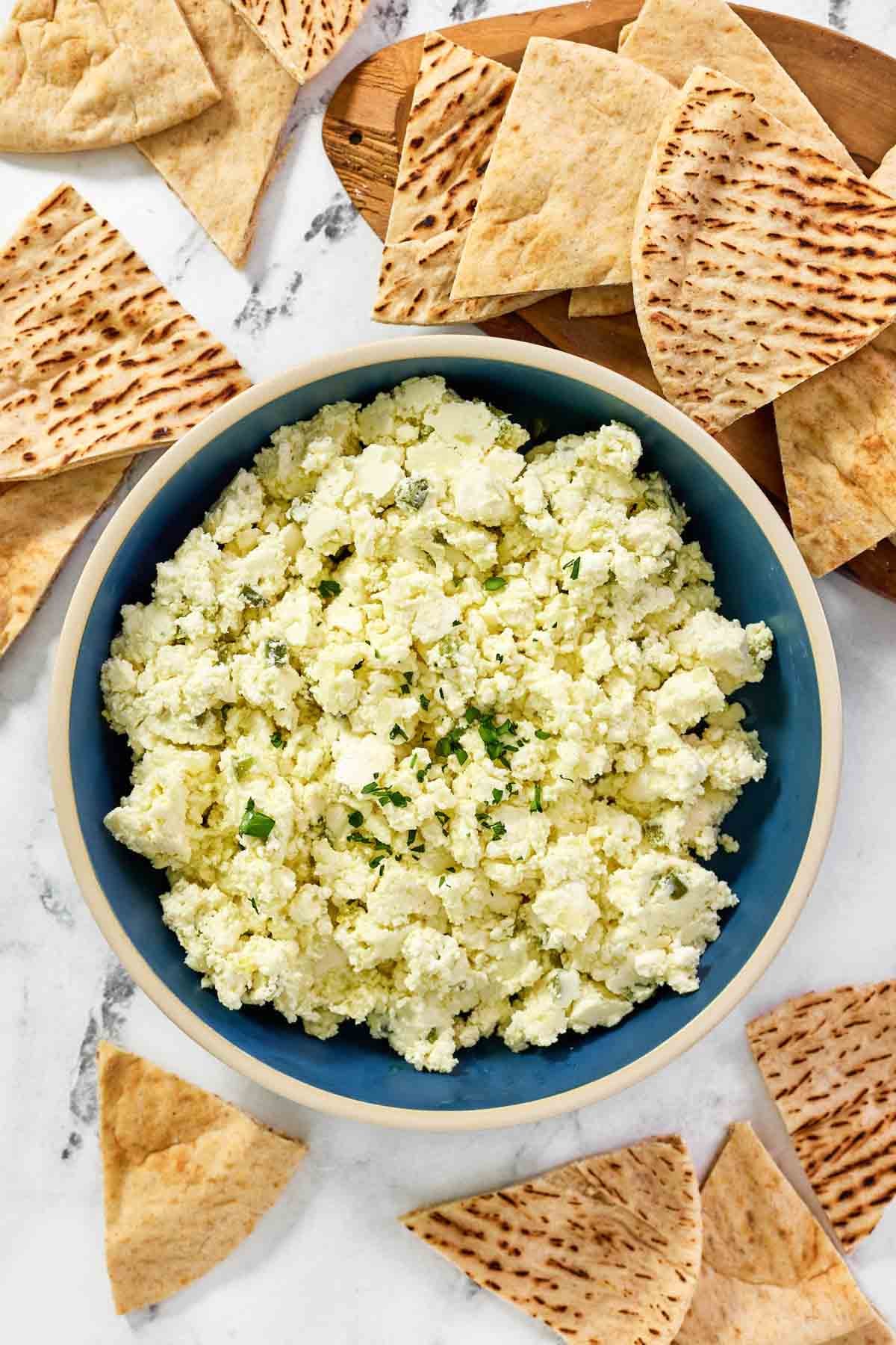 Spicy feta spread served with pita bread.