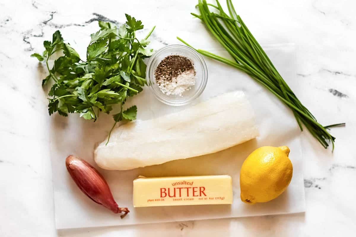 White fish, butter, lemon, shallot, herbs, salt, and pepper.