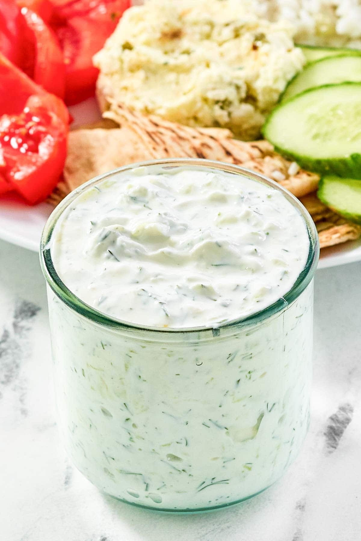 A jar of Mediterranean garlic dill yogurt sauce.