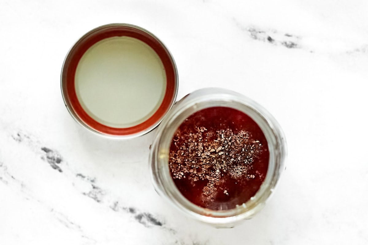 Mixing a spicy vinaigrette in a mason jar.