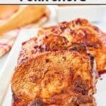 Air fryer thick cut bone-in pork chops cooked and on a platter.