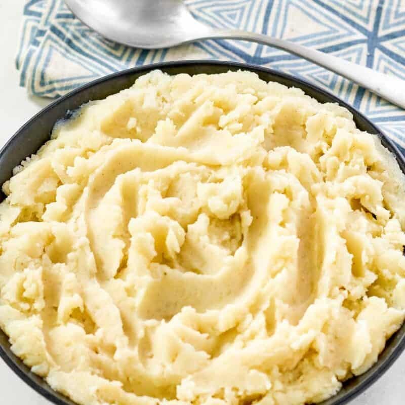 Buttermilk whipped potatoes in a serving bowl.
