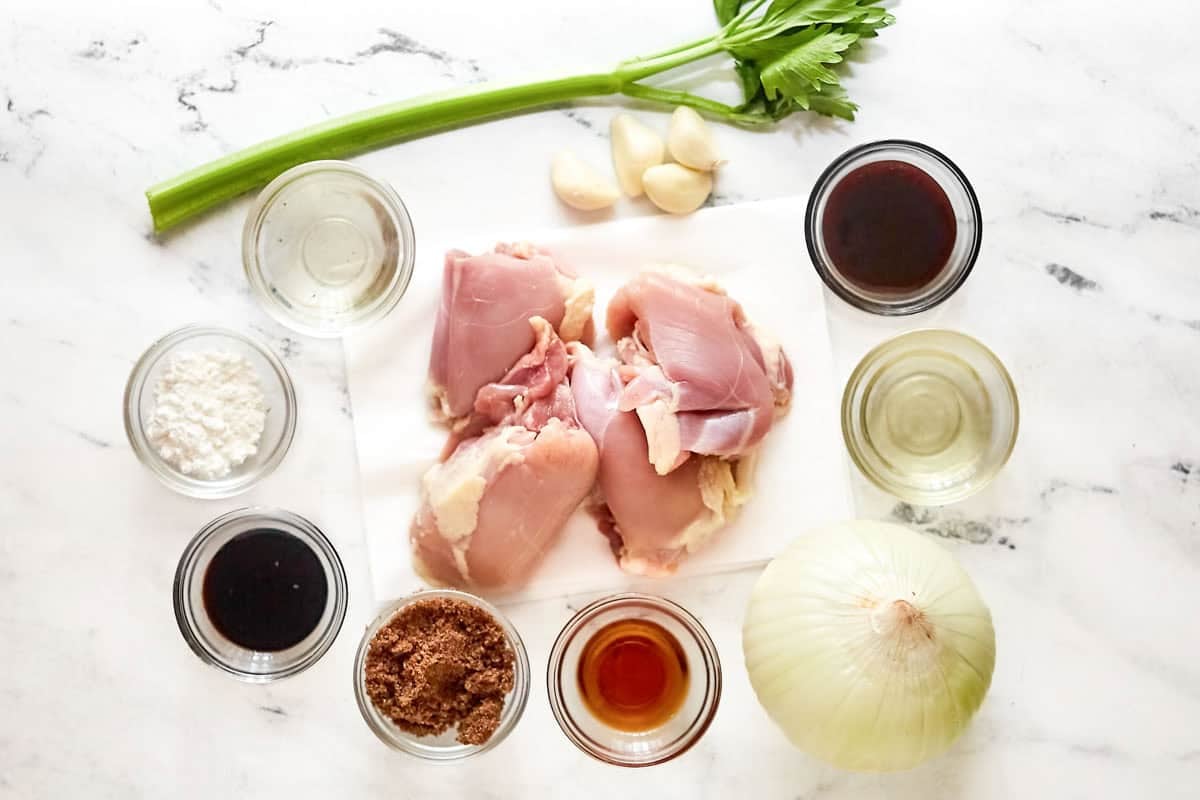 Chicken thighs, celery, onion, garlic, black pepper, sauces, and seasonings.