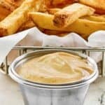 Copycat Freddy's fry sauce and fries behind it.