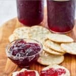 Homemade wine jelly served with crackers.