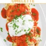 Copycat IHOP Colorado Omelette topped with sour cream.