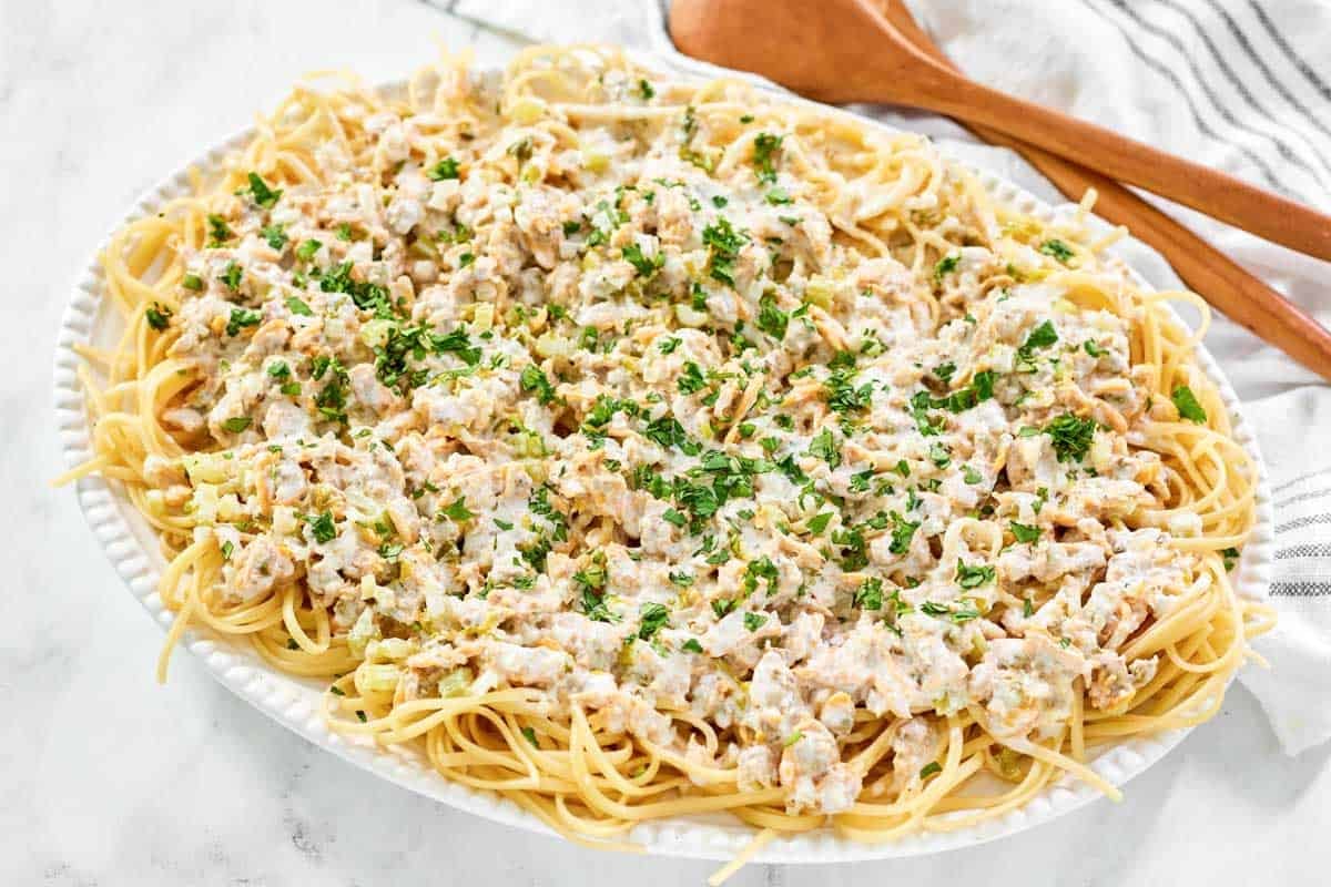 Linguine with creamy clam sauce on a platter.