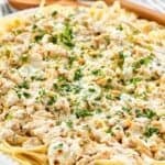 Copycat Old Spaghetti Factory white clam sauce served over linguine pasta on a platter.