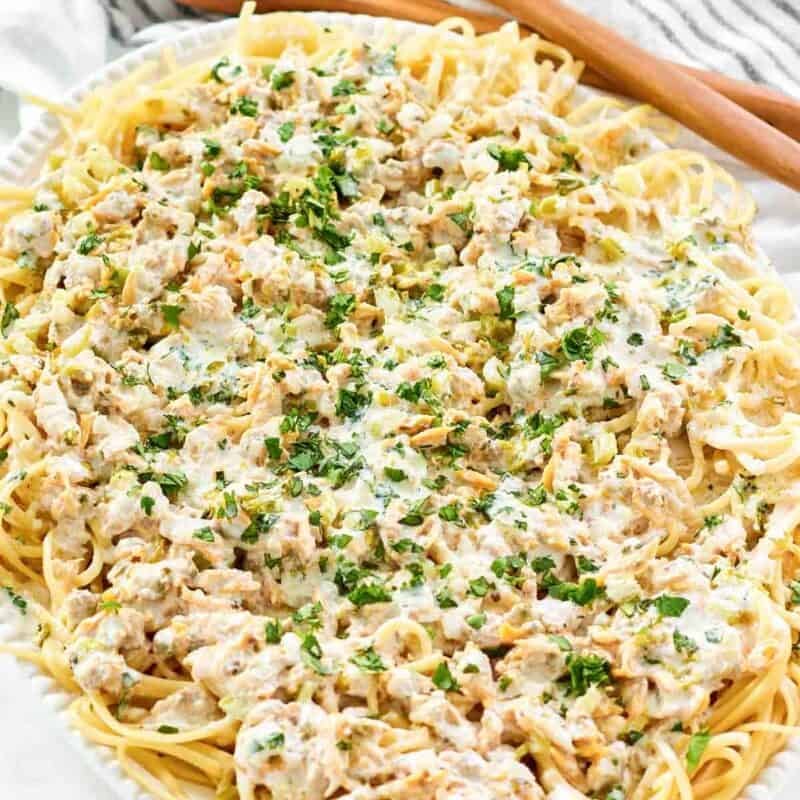 Pasta with creamy clam sauce on a large platter.