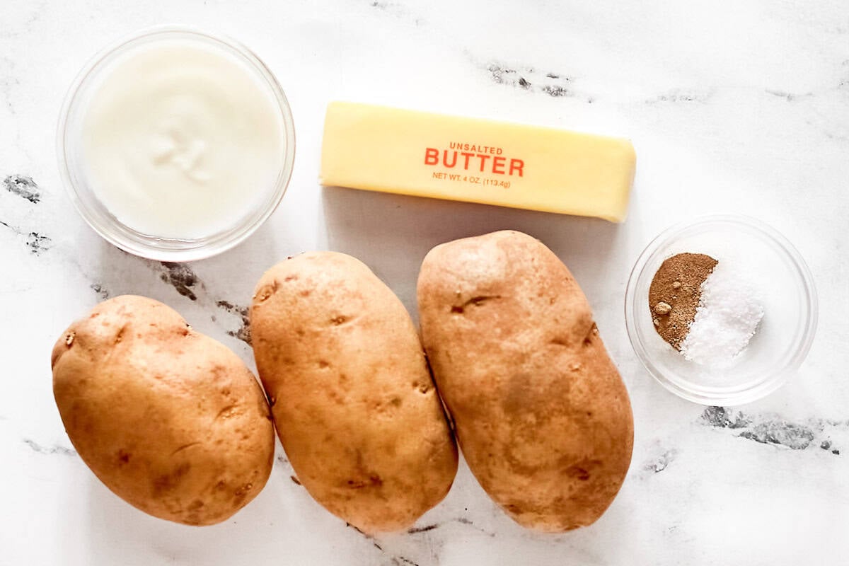 Russet potatoes, butter, buttermilk, salt, and pepper.