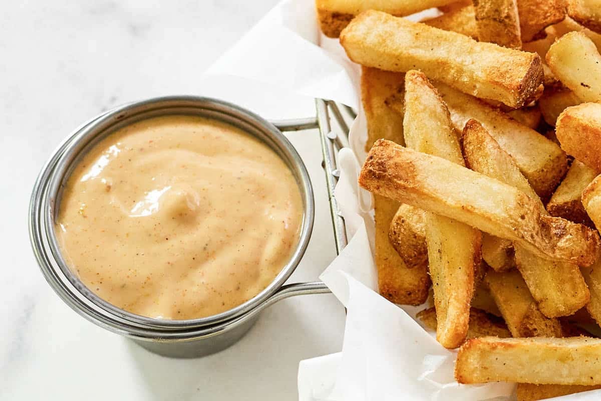 Tangy and creamy sauce served with French fries.