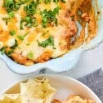 Cheesy Texas trash dip in a baking dish.