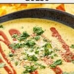 Copycat Torchy's green chile queso garnished with chopped cilantro.