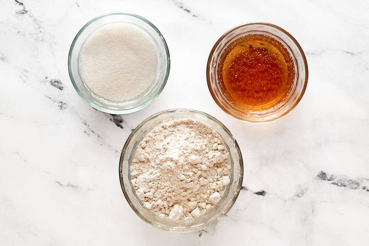 Beer, sugar, and Bisquick mix in bowls.