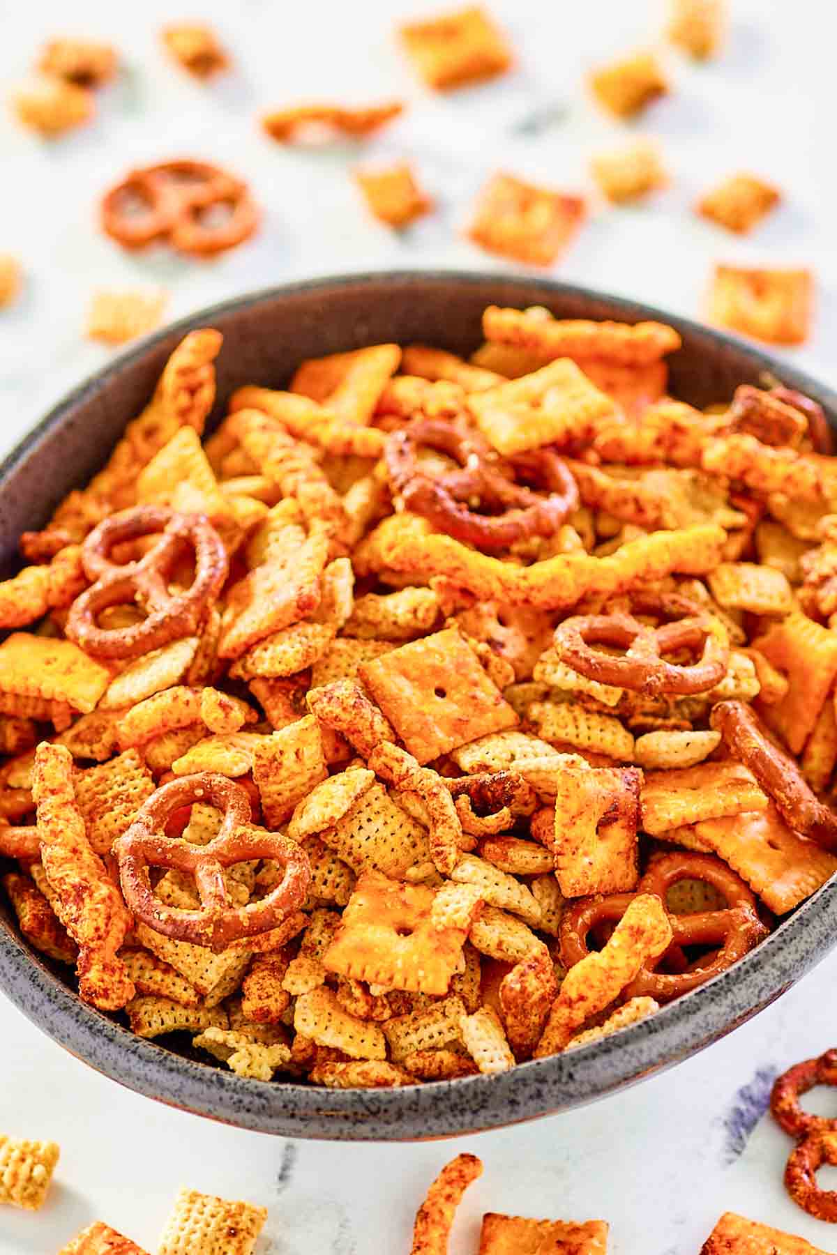 Cheese cracker, pretzel, and cereal snack mix.