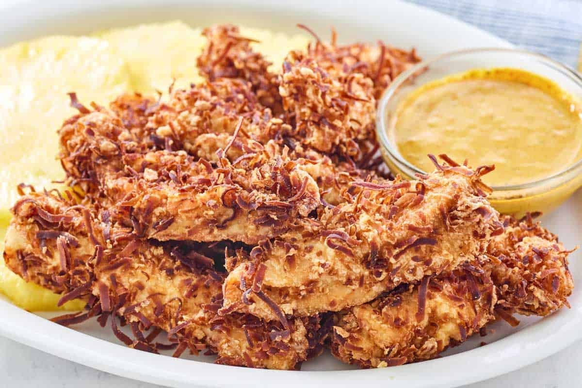Fried coconut chicken strips served with honey mustard sauce.