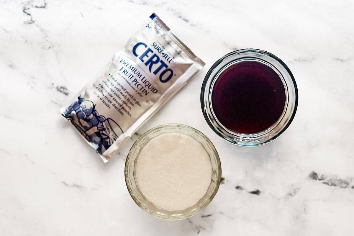 Certo liquid fruit pectin, wine, and sugar.