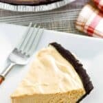 A slice of copycat Afternoon Delight peanut butter pie and a fork on a plate.