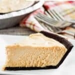 A slice of copycat Afternoon Delight peanut butter pie and the pie behind it.