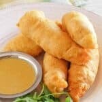 Copycat Chili's chicken crispers with honey mustard dipping sauce.