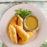 Copycat Chili's chicken crispers served with homemade honey mustard sauce.