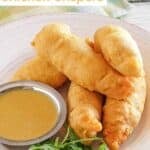 Copycat Chili's chicken crispers and honey mustard sauce on a plate.
