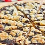 Sliced copycat Cicis chocolate pizza on a pizza peel.