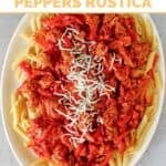 Copycat Olive Garden sausage and peppers rustica garnished with mozzarella.