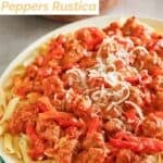 Copycat Olive Garden sausage and peppers rustica pasta on a platter.