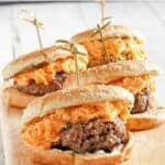 Burgers topped with pimento cheese.