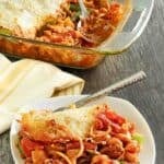 Copycat Pizza Hut cavatini on a plate and in a glass baking dish.