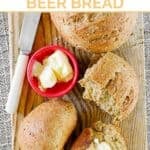 Copycat Saltgrass Steakhouse shiner bock beer bread loaves and a small cup of butter.