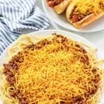 Spaghetti topped with copycat Skyline chili and shredded cheddar cheese.