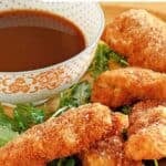 Copycat TGI Friday's Jack Daniel's sauce served with chicken tenders.