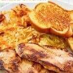 Copycat Waffle House grilled chicken, hash browns, and toast on a plate.