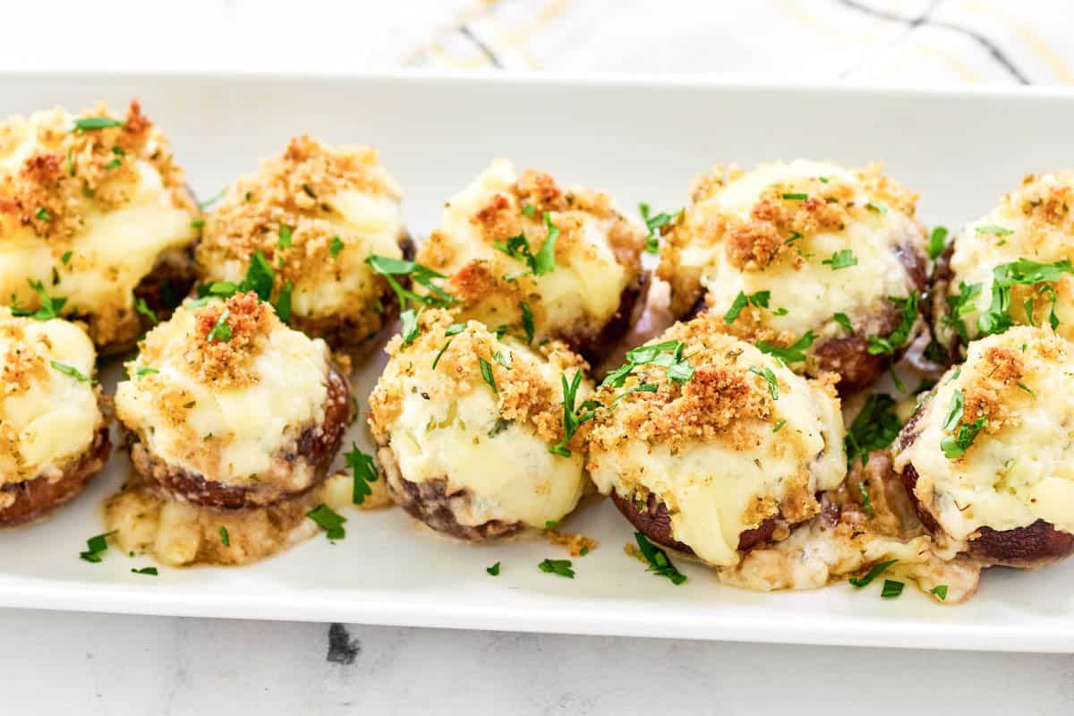 Baked mushrooms cheese stuffed with Alfredo sauce and breadcrumb topping.